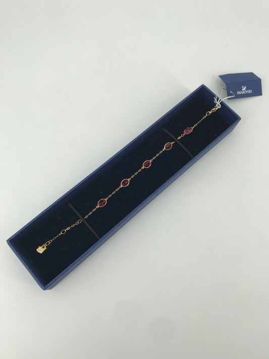 Bracciale swarovski dorato con pietre rosse art 1076331